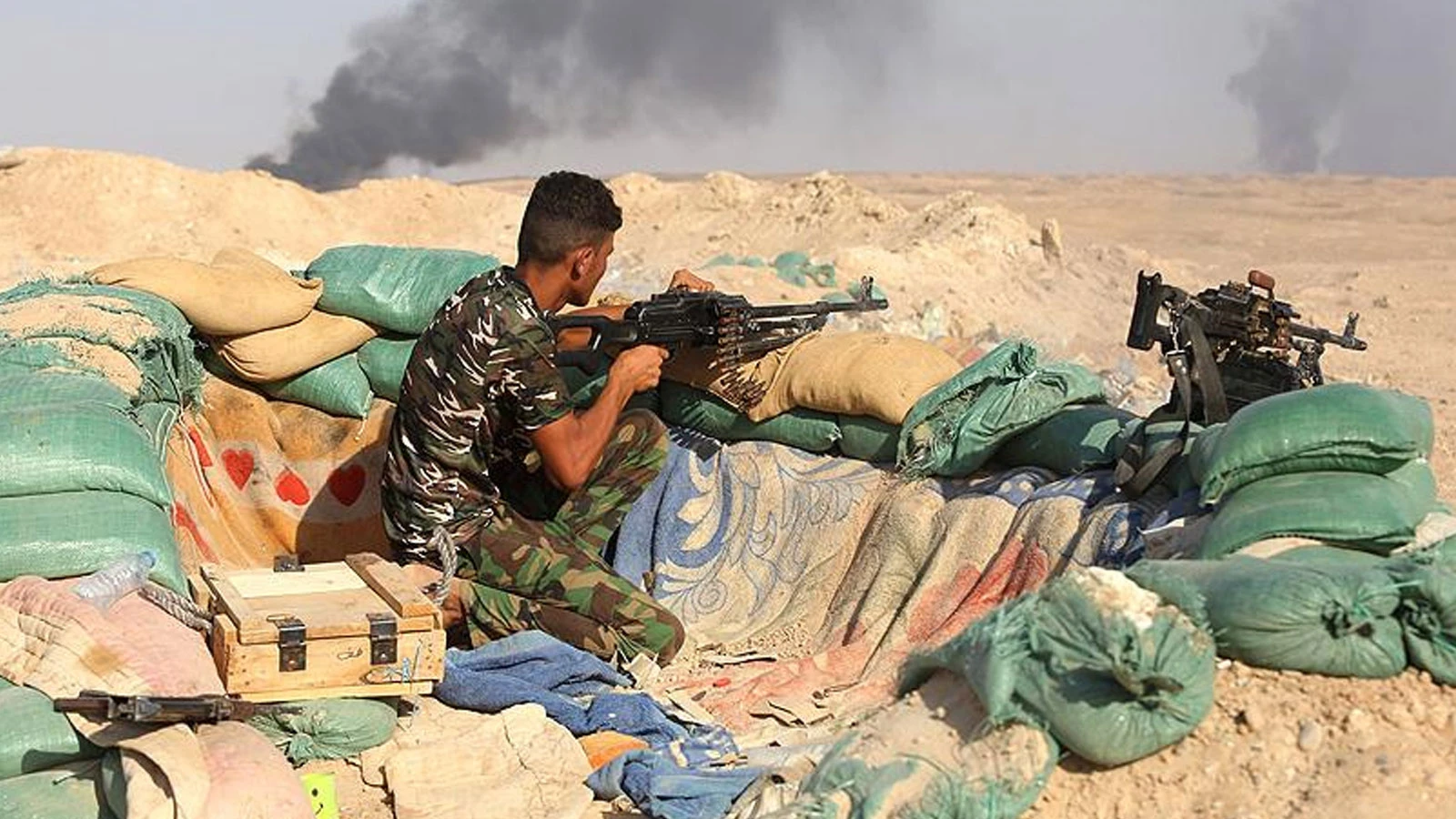 Une autre milice chiite en Irak a remis son stock d'armes au gouvernement